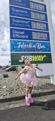 confident girl rising fuel costs